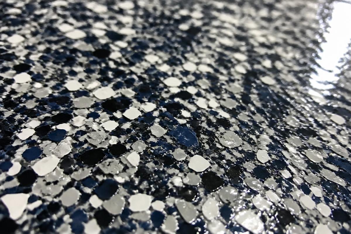 Close-up of blue and silver epoxy flake texture